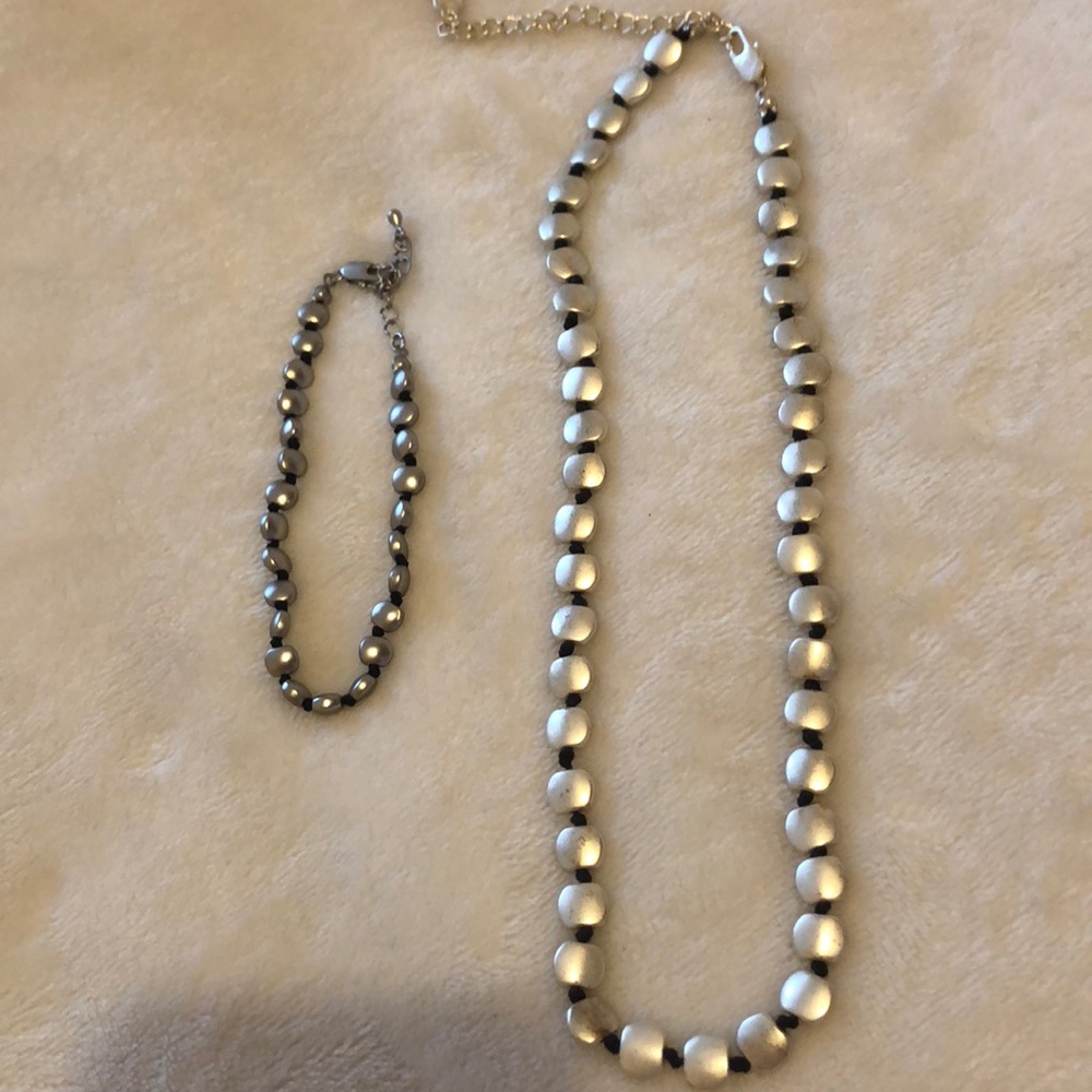 Silver tone necklace and bracelet